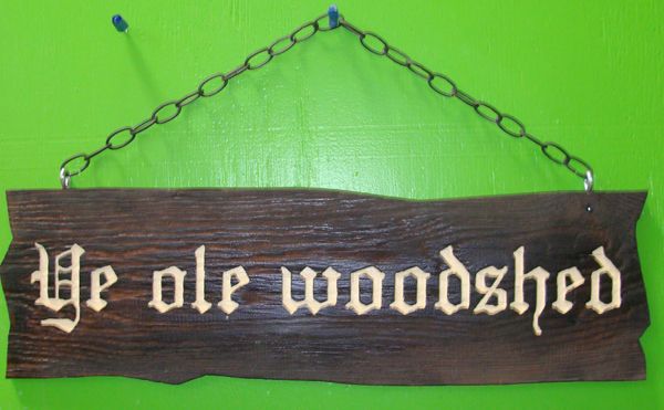 O24953 - Rustic Carved Wood Sign with Chain Hanger "Ye Ole Woodshed"