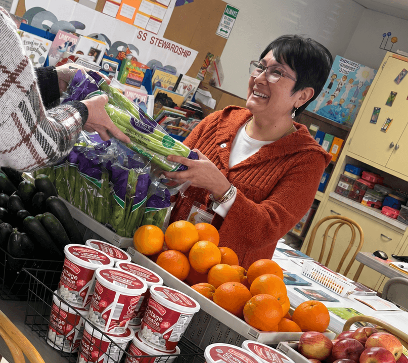 Mooncrest volunteers helping with fresh food distribution