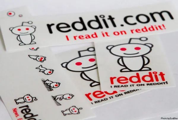 Reddit.com sticker sheet featuring the Snoo mascot in multiple sizes, an example of custom die cut stickers used for brand recall.