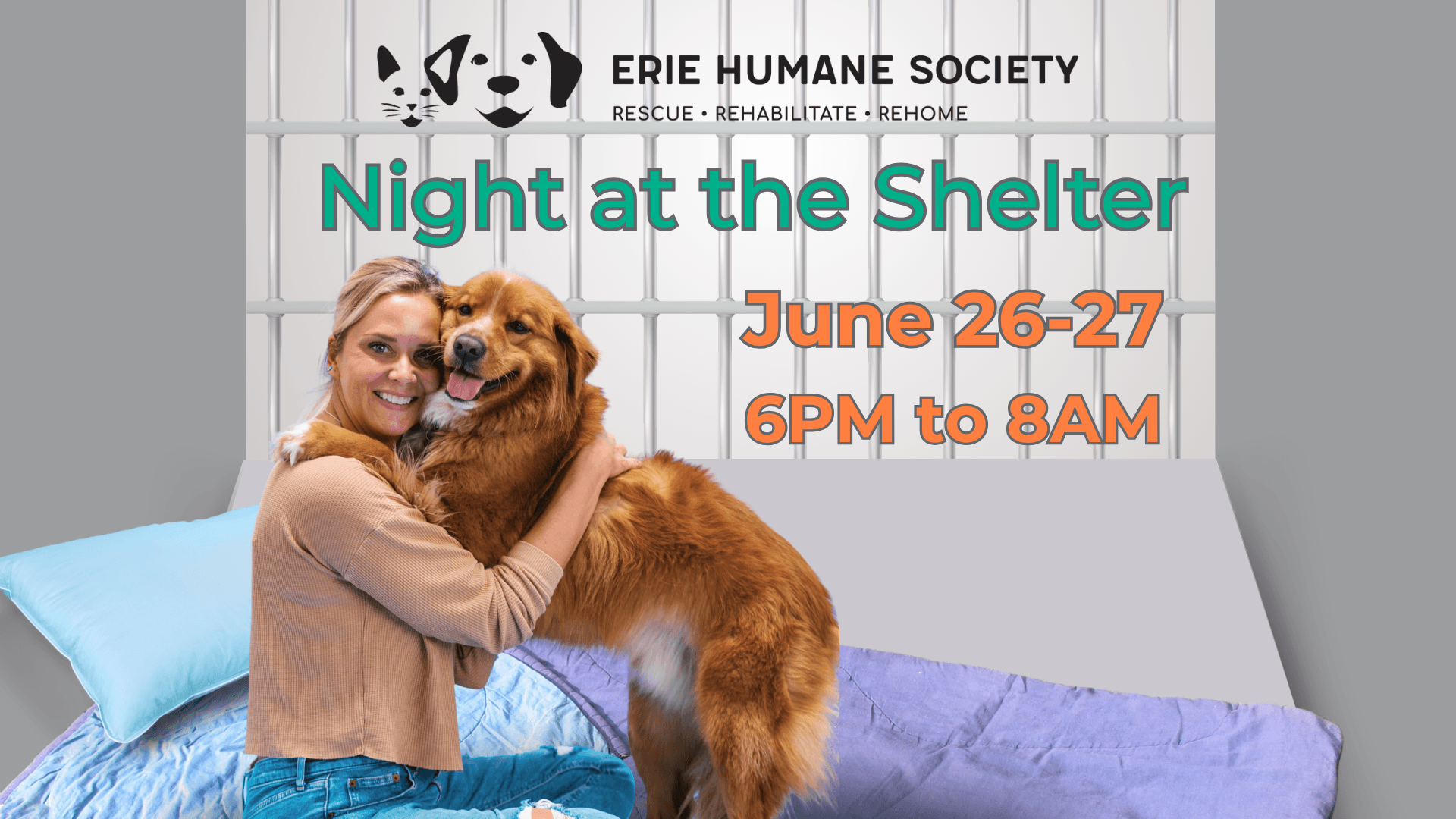 A volunteer embraces a shelter dog in a kennel setting
