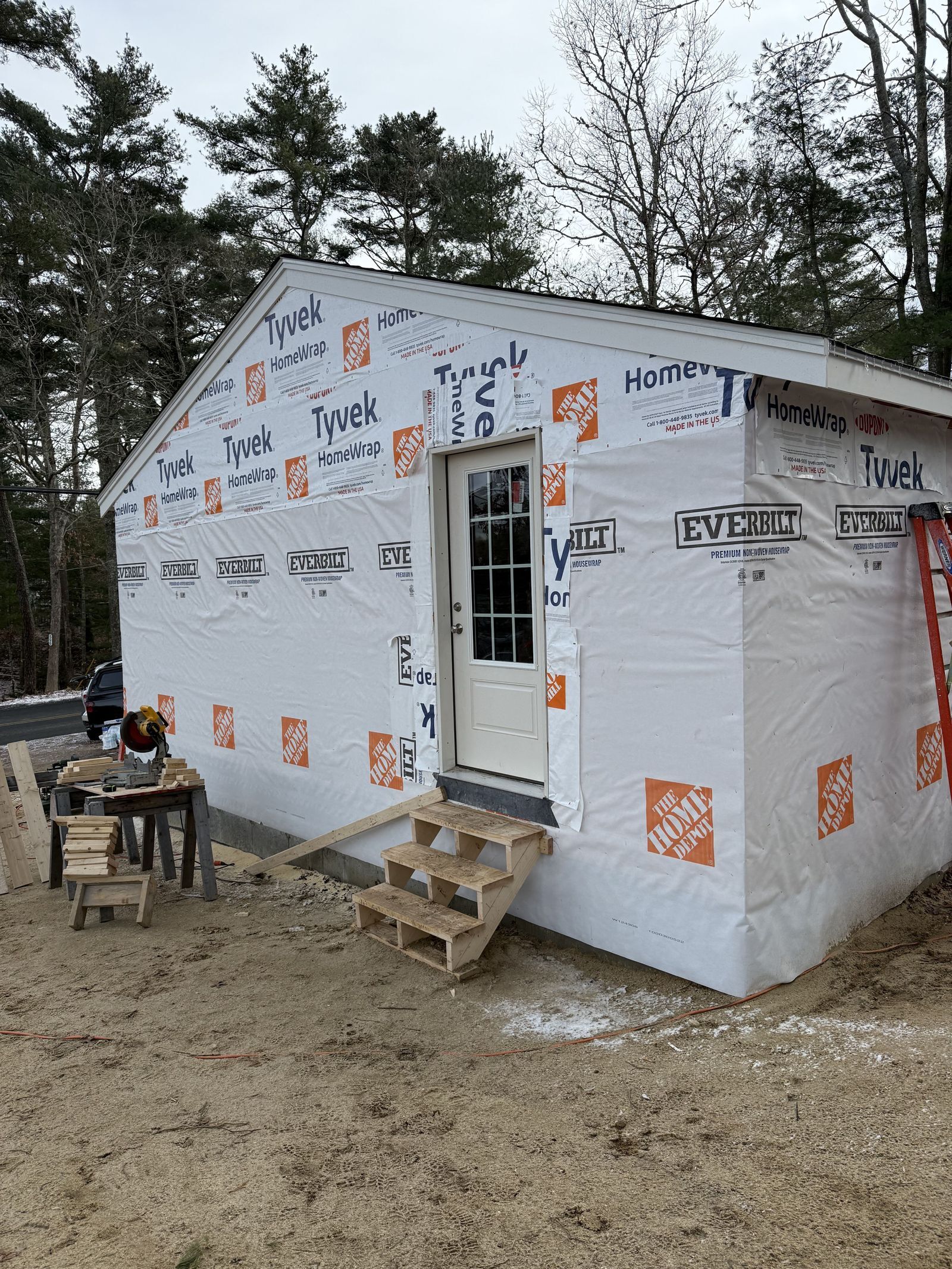 Photo showing exterior of house with a new side door