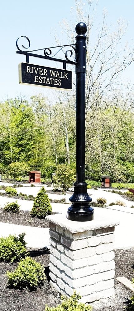 H17007 - Street Name Sign with Frame, hung from a Straight Horizontal Bar mounted on an Aluminum Post with Decorative Scroll Bracket, Base and Finial