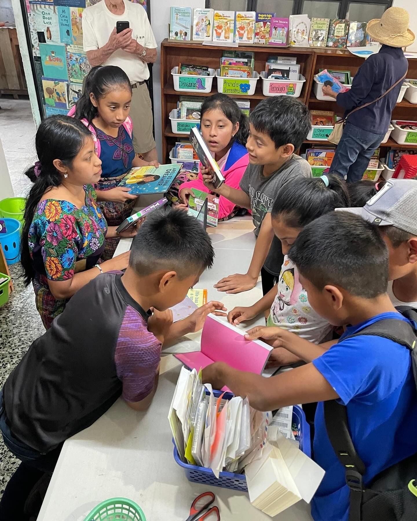 Group of kids reading books.