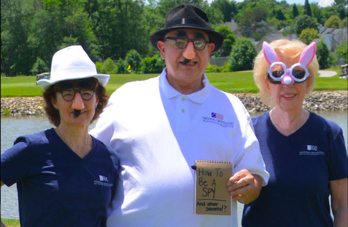 NCMF staffers at Spy Tee Off hole