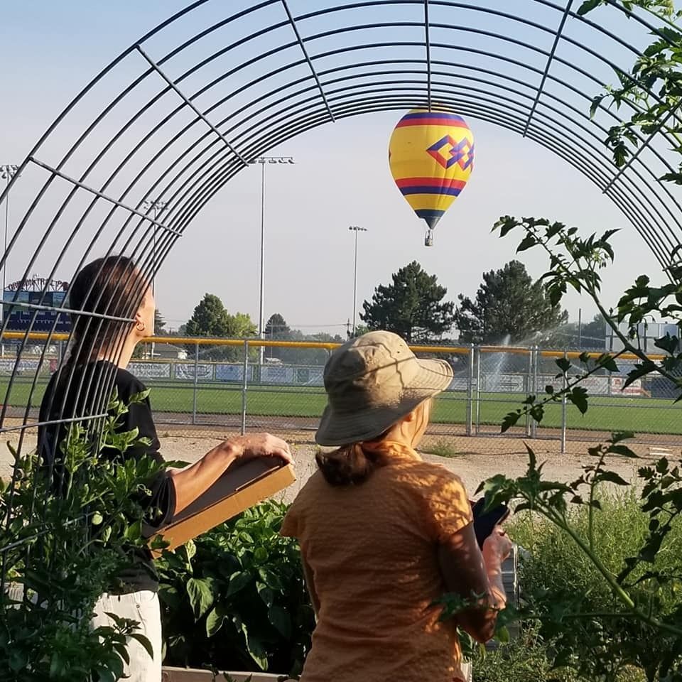 Volunteers from the the Gering Community Greenhouse enjoying the Old West Balloon Fest. Both of these organizations are managed funds of the OTCF!