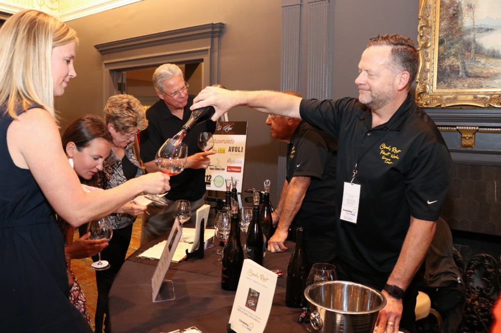Pinot, Pigs & Poets Clouds Rest Pouring Wine