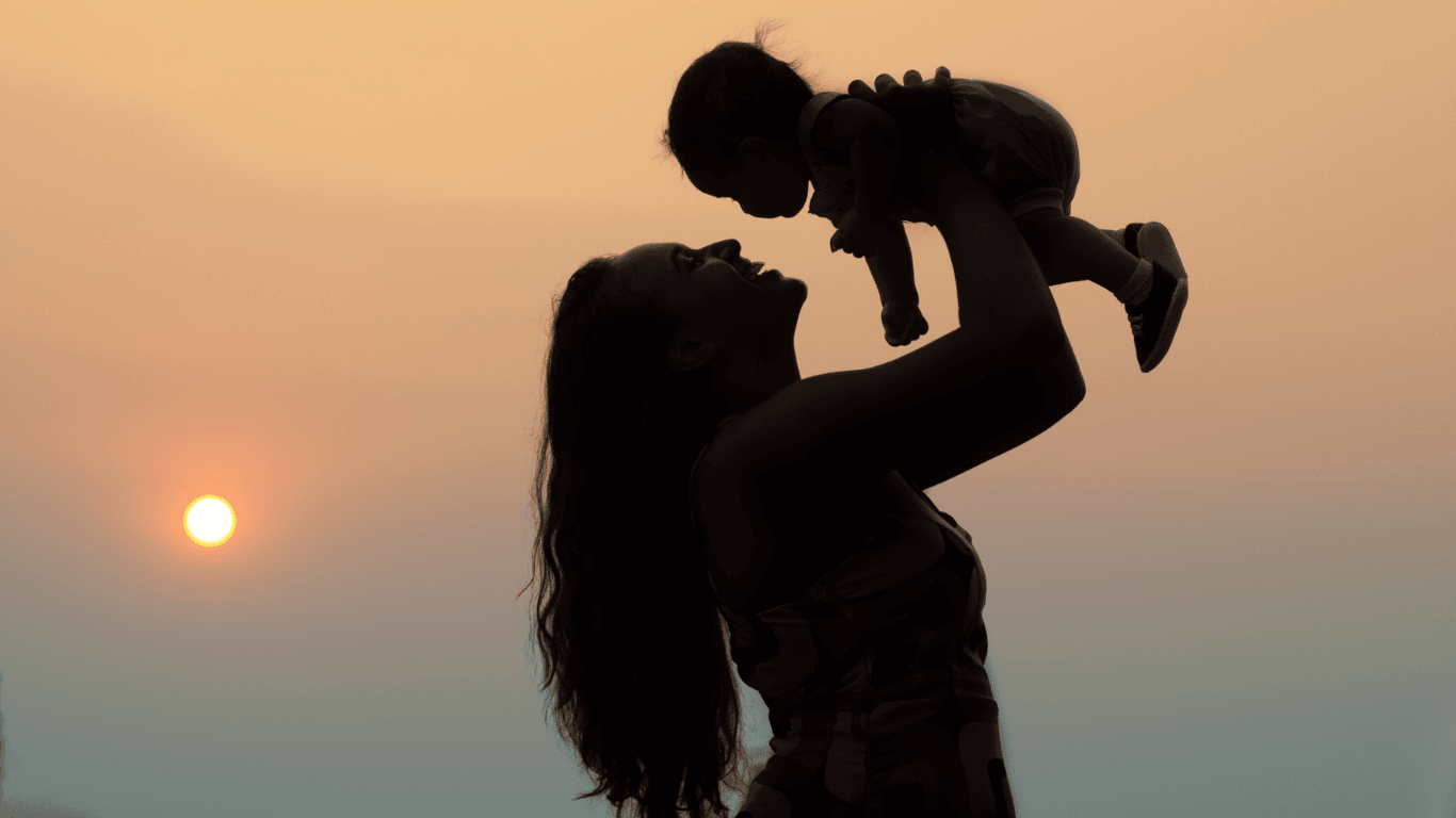 Silhouette of a mother and child