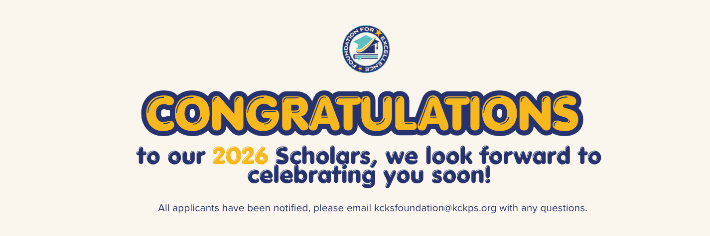 Students holding scholarship checks