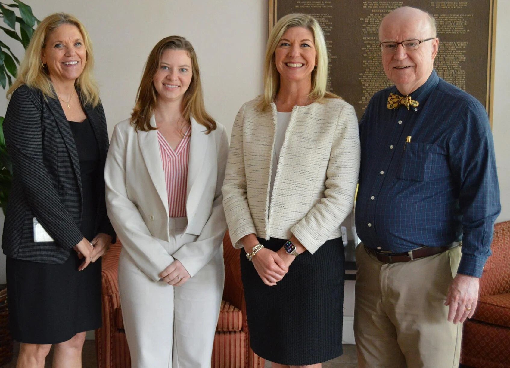 Jennifer Trefelner, diocesan director of communications and development, second from right, with members of the communications team, including Jackie Nadel, left, Theresa Kisrow and William Cone.