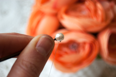 Use glue and thread on your new pearl bobby pin for extra adhesive.