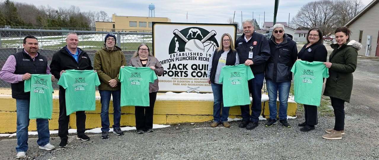 Runners and walkers at the Elderton Plumcreek 5K Run/Walk, a community event supported by local sponsors including the David C. Kohl Family Fund.