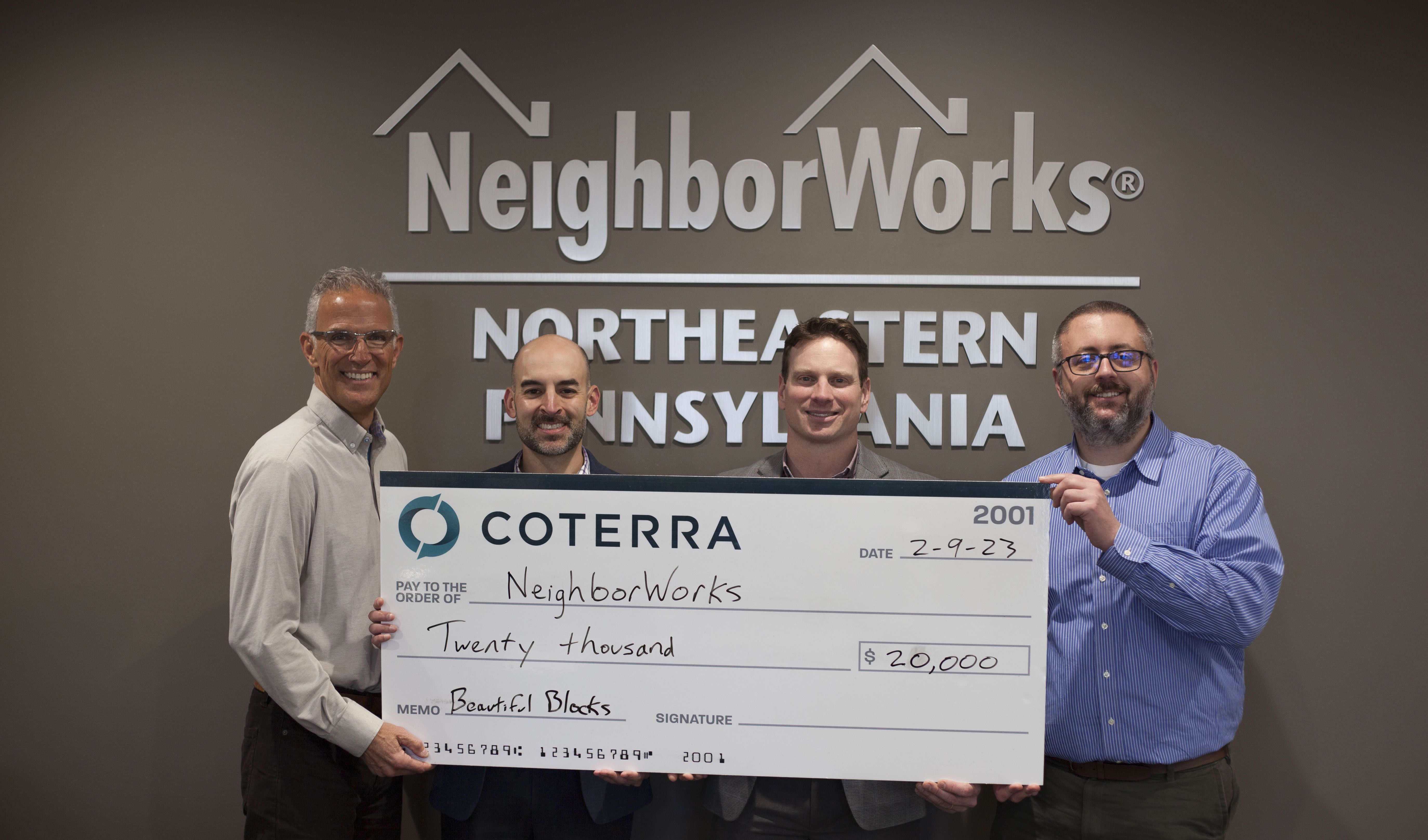 George Stark, Director, External Affairs, Coterra Energy; Todd Pousley, Neighborhood Revitalization Manager, NeighborWorks Northeastern Pennsylvania; Jesse Ergott, President and CEO, NeighborWorks Northeastern Pennsylvania; Bill desRosiers, Ma