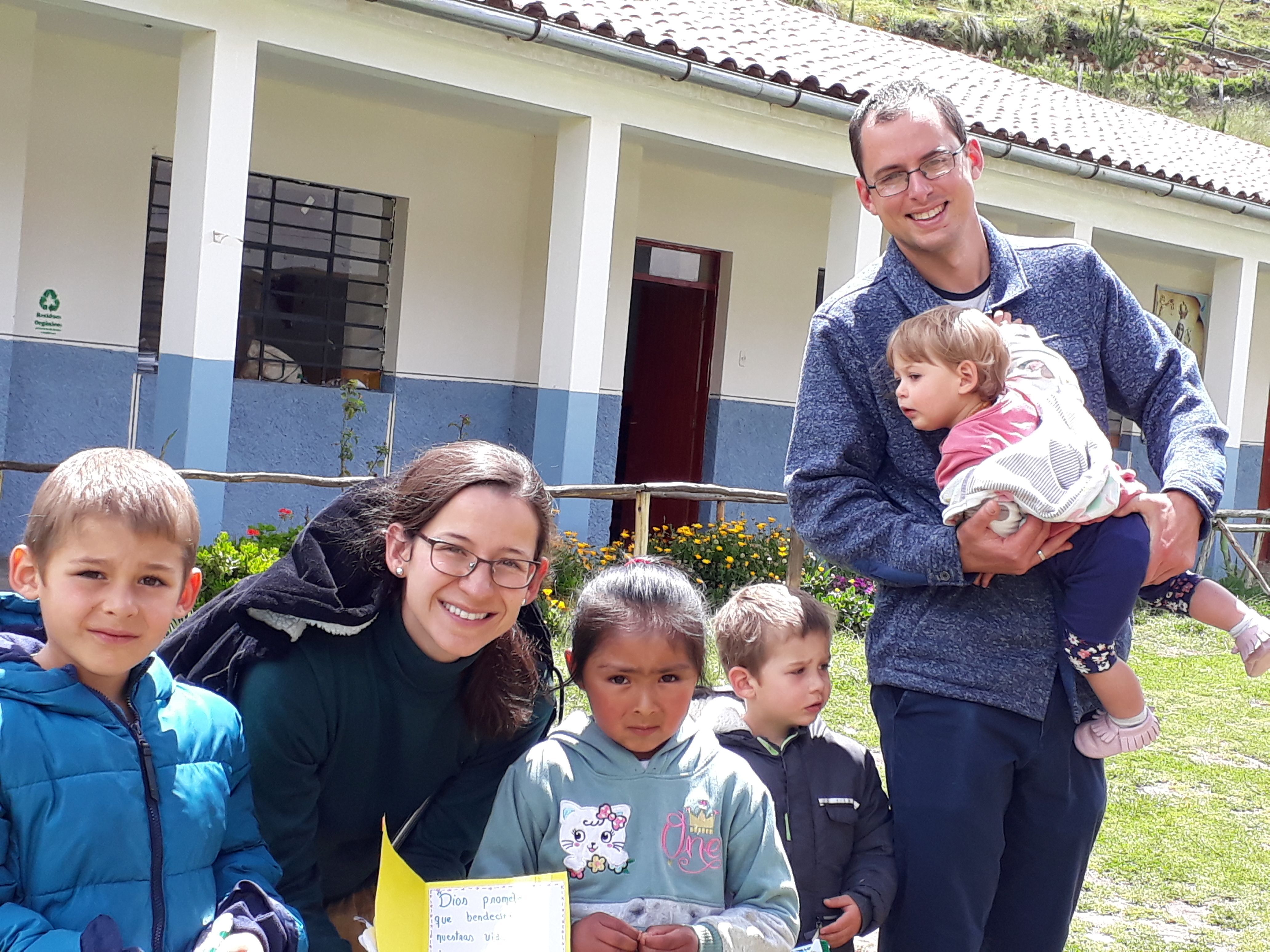 Dr. Aaron Patzwahl, MD and his wife volunteer with love.