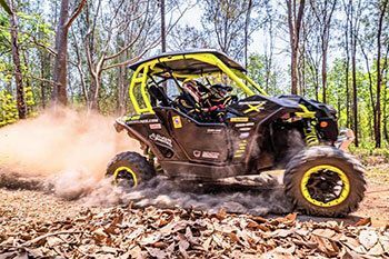 ATV driving in a forest.