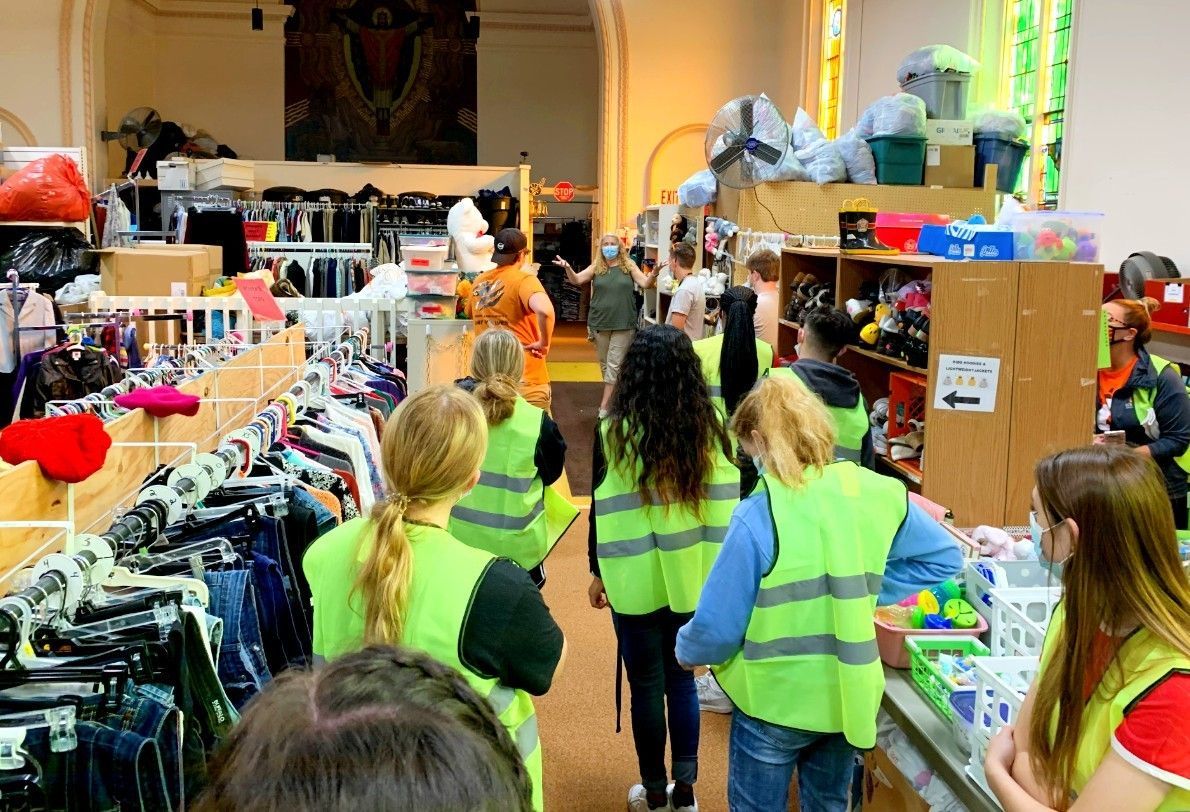 Neighborhood Cleanup Volunteers Tour our Helping Hands of St. Louis Clothing Center
