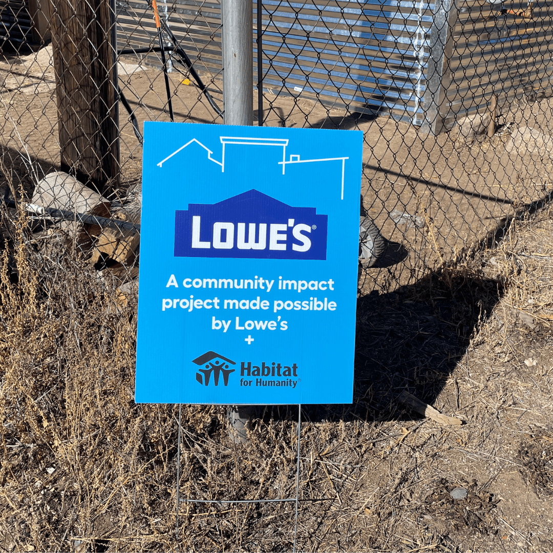 Image of Lowe's sign at a repair site.