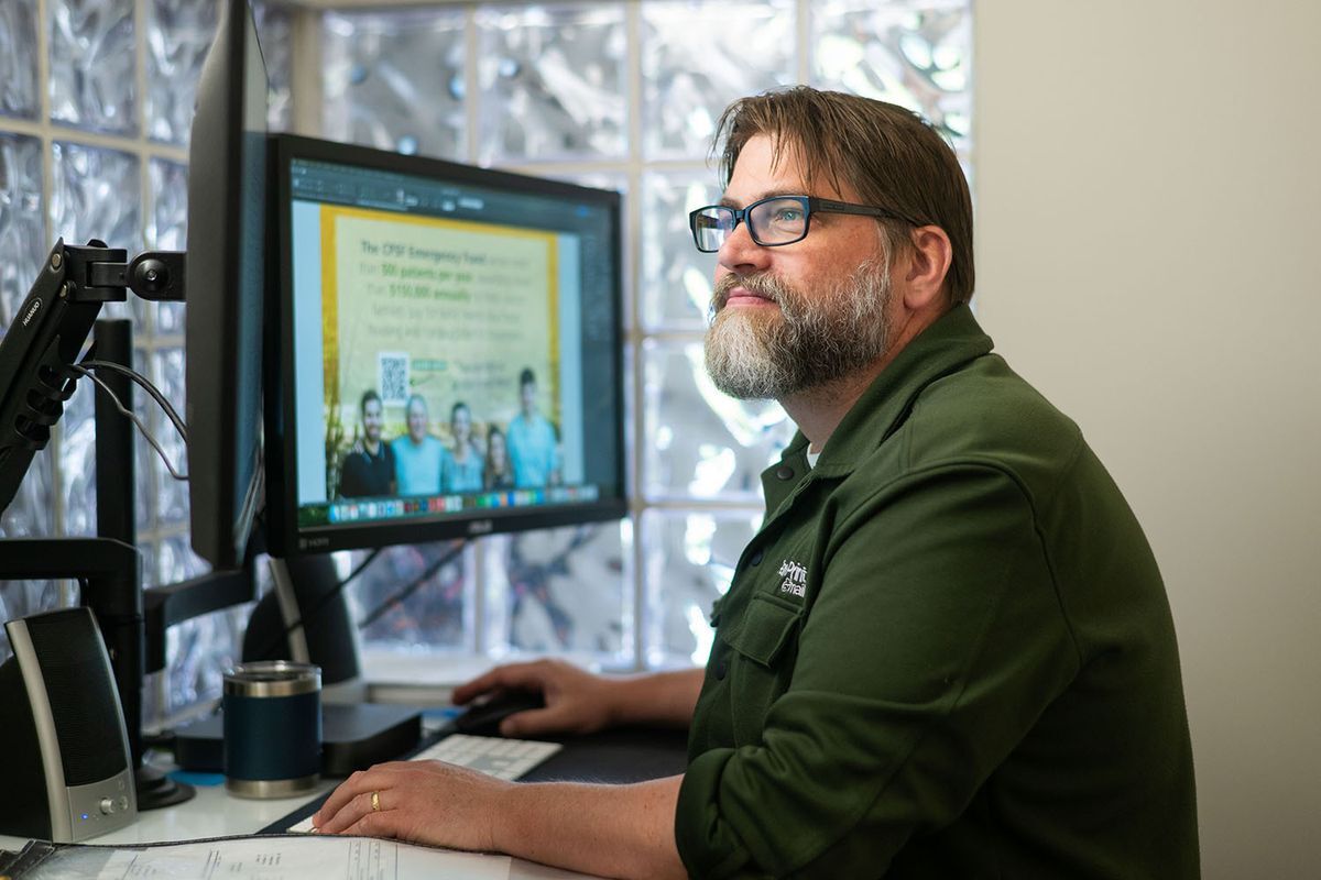 Man working at computer doing graphic design