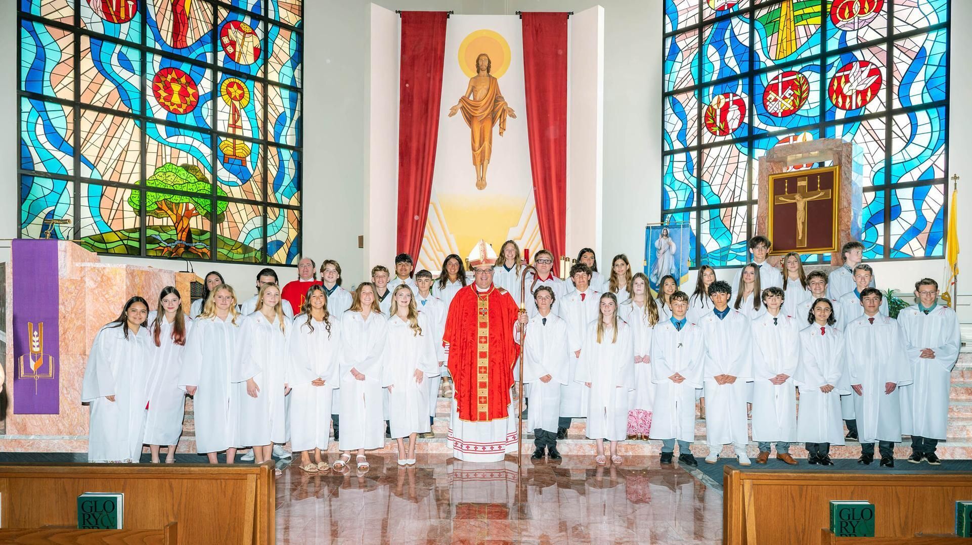 New bishop, Most reverend Manuel de Jesus Rodriguez with newly confirmed at Holy Redeemer in Palm City, February 2026