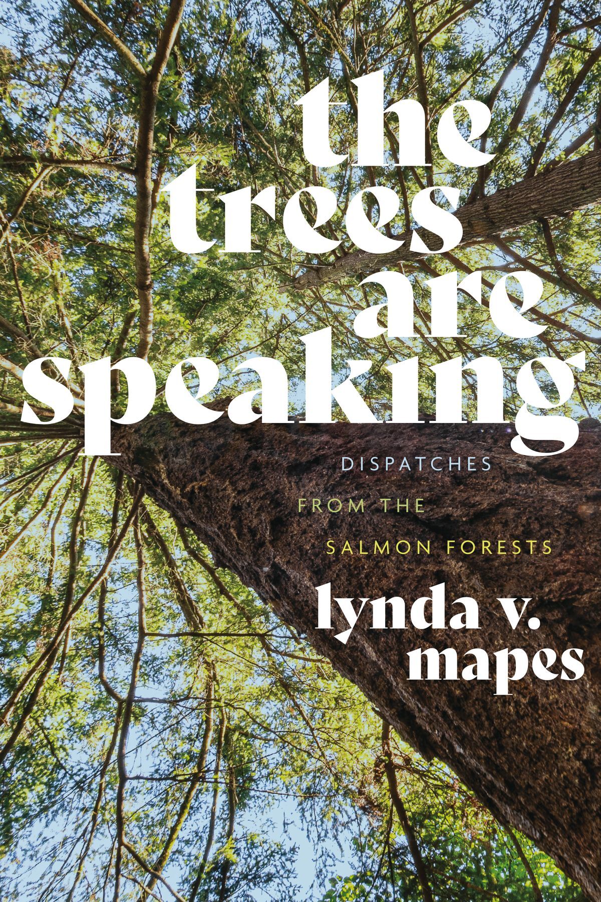 A book cover with a big tree in the background with text, "The Trees are Speaking"