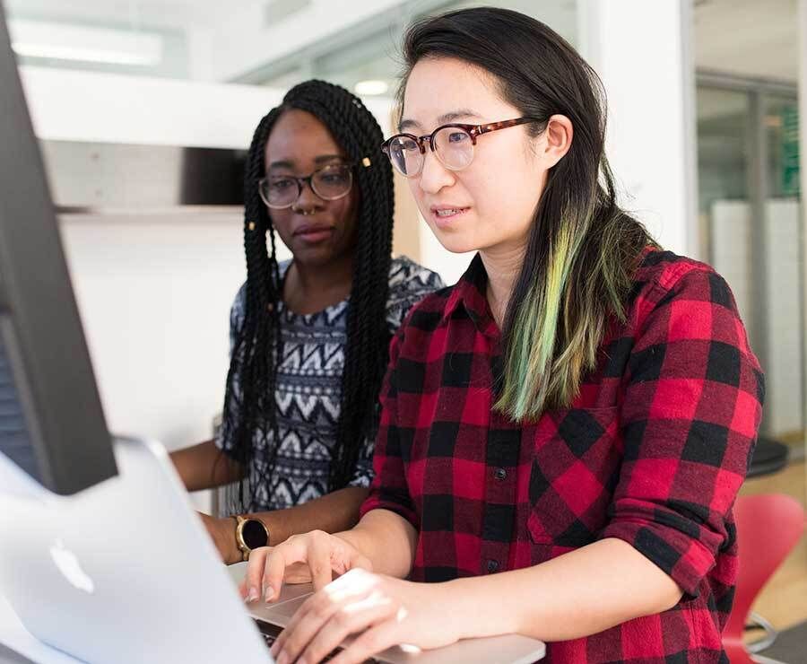 Two Women Reviewing Project