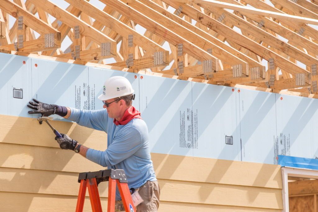 Woman and Boy at Kitchen Sink