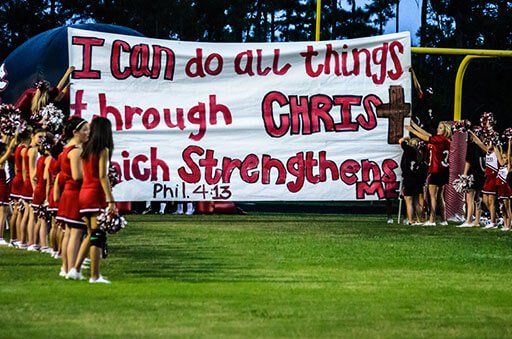 Court Declares Cheerleaders’ Bible Verse Banners are Legal