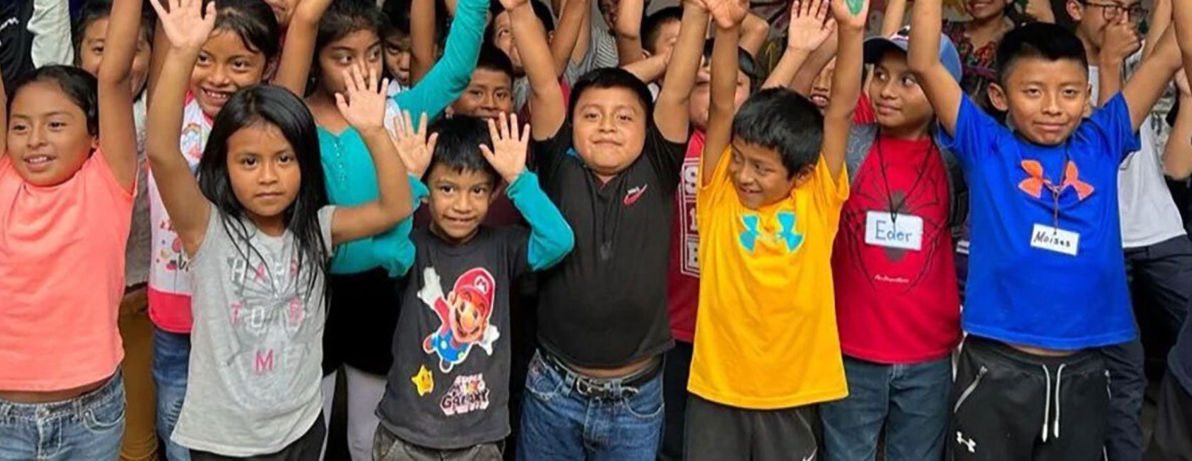 Children raising hands