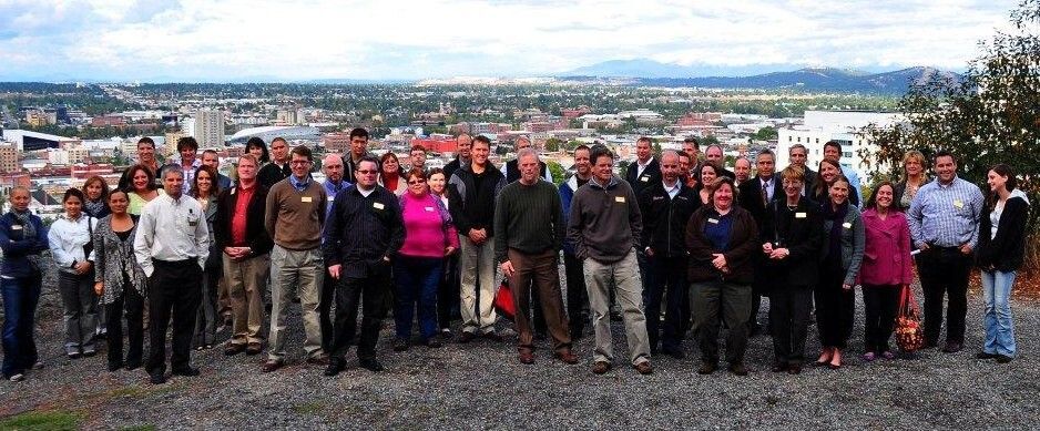 A group of people posing for a group photo