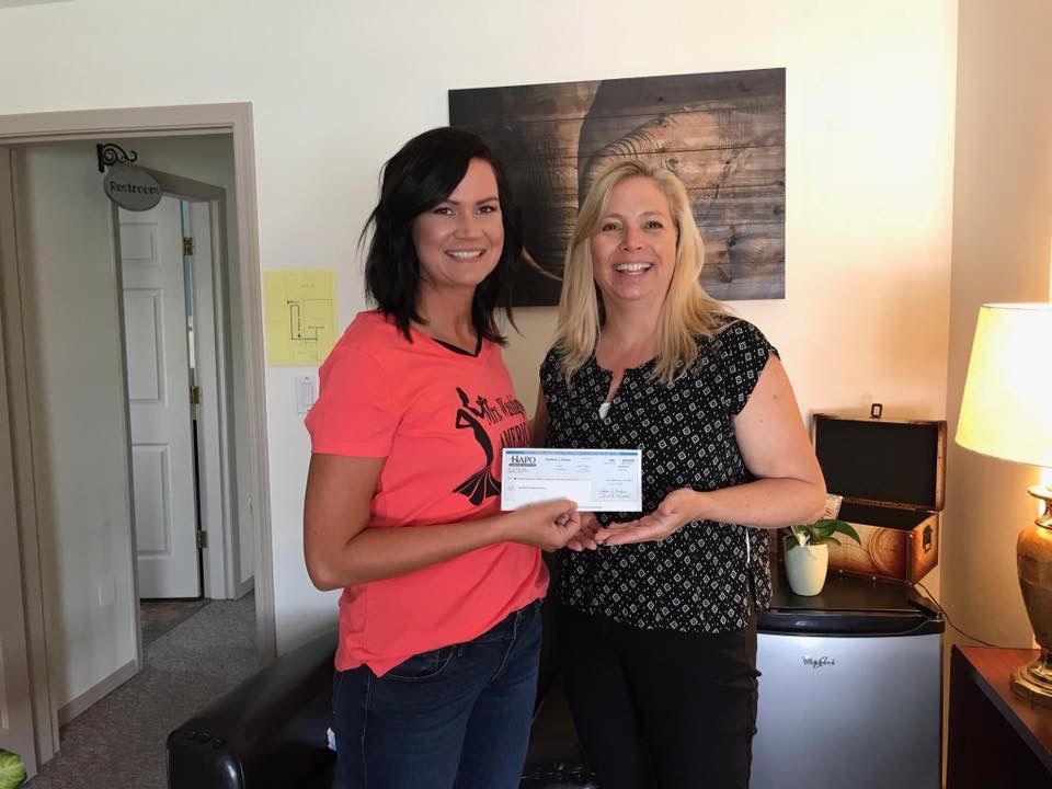 Mrs. Tri-Cities 2018 came in to bring a donation from the proceeds of her “Queendom” t-shirt sales