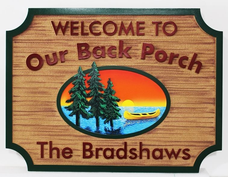 M22373 - Carved 2.5-D  HDU Property Name Sign "Welcome to Our Back Porch -The Bradshaws", featuring a Canoe, 3 Pine Trees and a Setting Sun as Artwork.