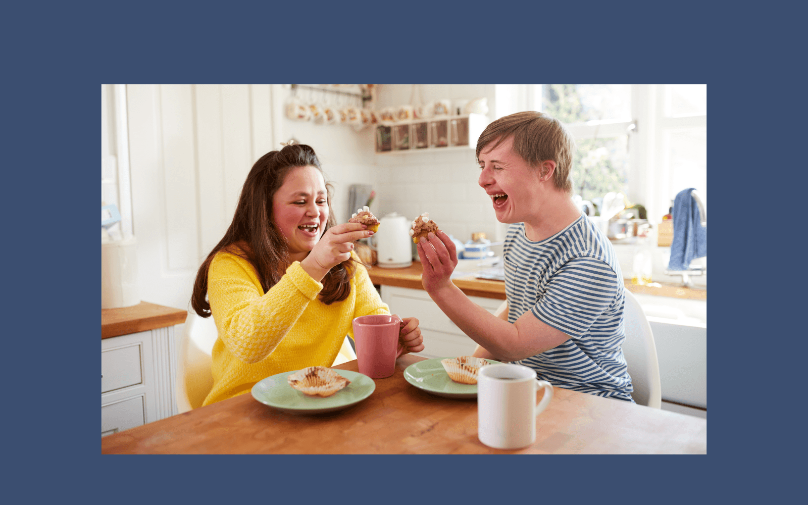 Woman with black hair has her arms around man with black hair as they are baking.