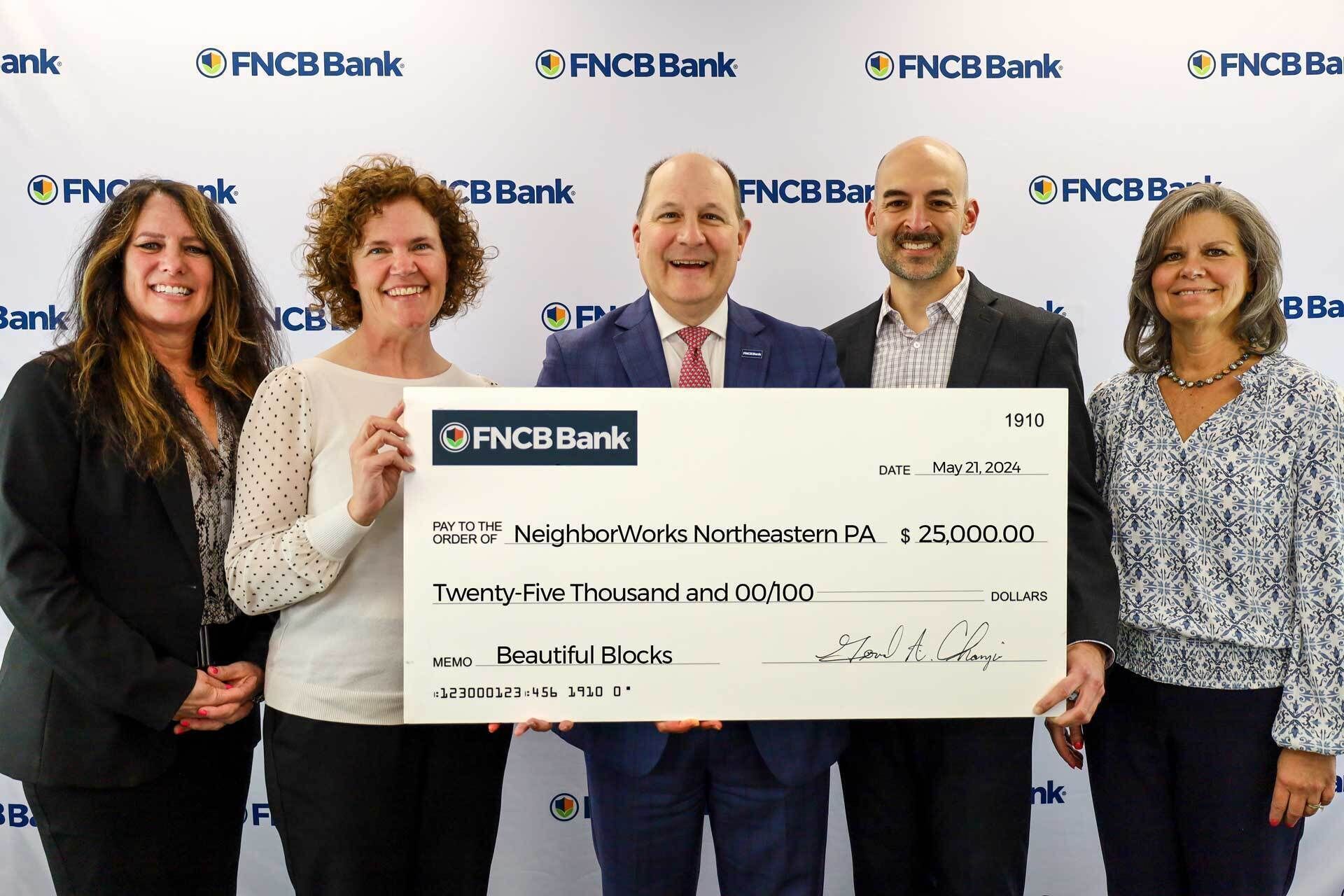 NeighborWorks receives contribution from FNCB Bank through Neighborhood Assistance Program