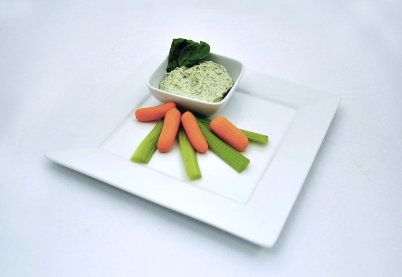 Baby carrots and celery with spinach dip