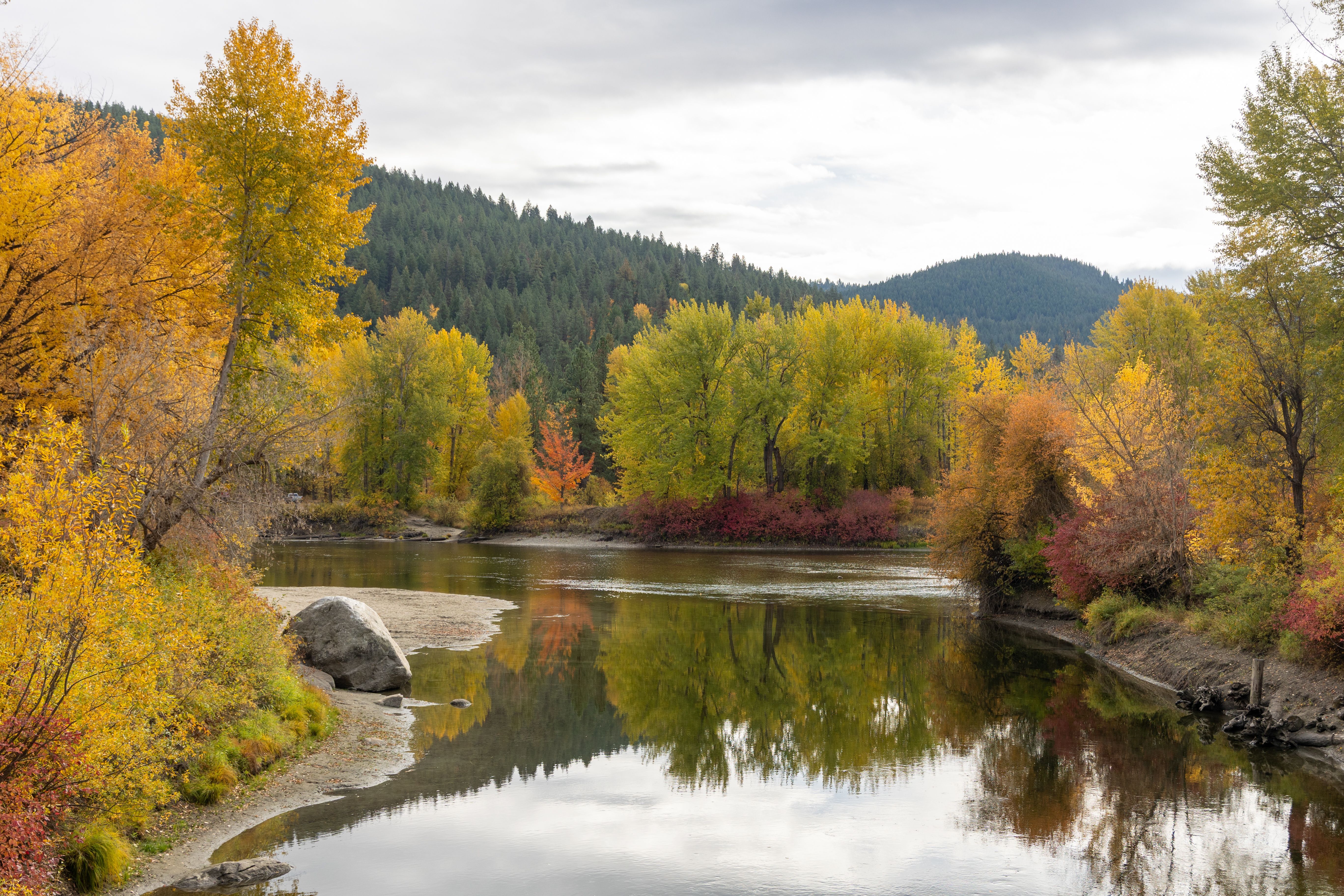 A beautiful fall display of colors overlooking the Wenatchee River from the bridge to Blackbird Island.