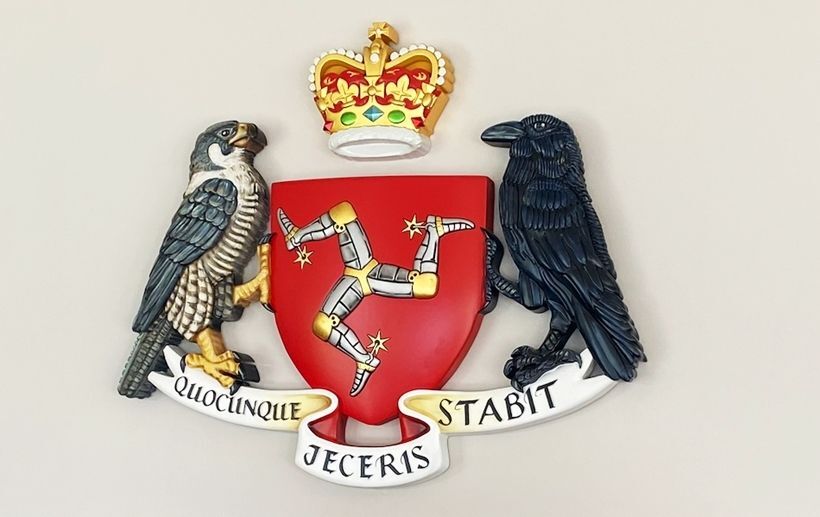 XP-1002- Carved 3-D Artist-Painted Plaque of a Family's Coat-of-Arms with  a Crown, a Hawk and a Raven, and a Shield  with three Armored Legs