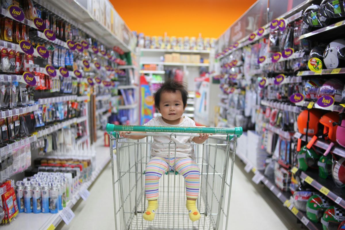 Toddler in shopping cart