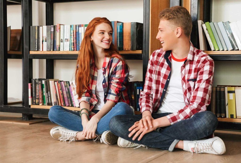 Photo of students in the library.