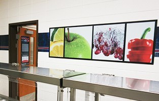 Food art mural in school café wall, custom signs, images of fresh fruit and vegetable