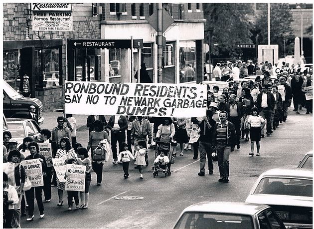 Ironbound residents march up Ferry St. June 1, 1984, in opposition to the construction of a huge garbage incinerator in the neighborhood which would have emitted dioxin and other toxic chemicals.