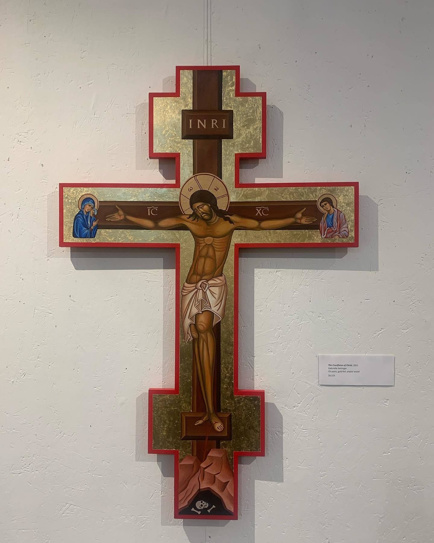 Christ on a golden crucifix by artist Gabrielle Kettinger