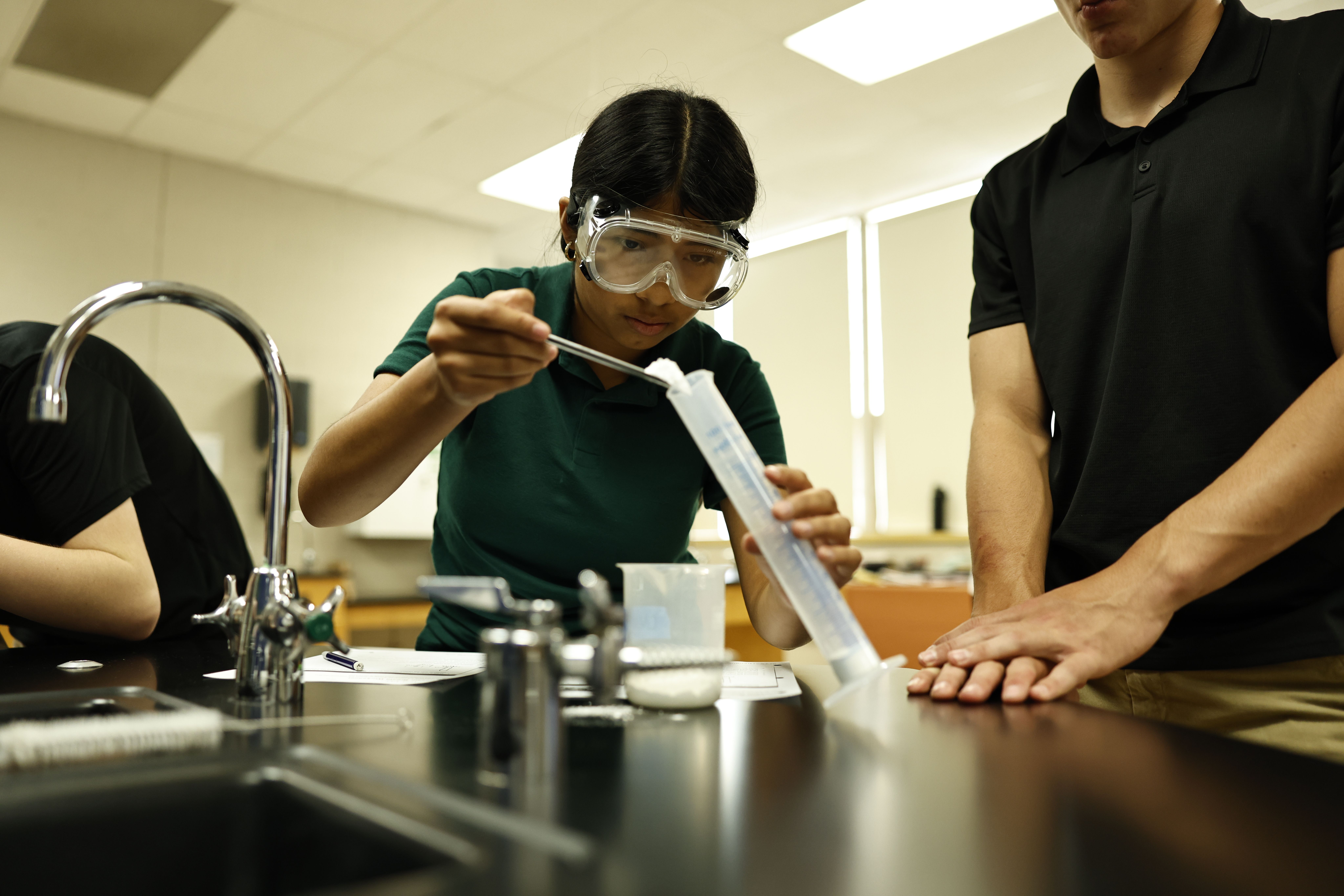 Sixth grade students working on an interactive STEM project 