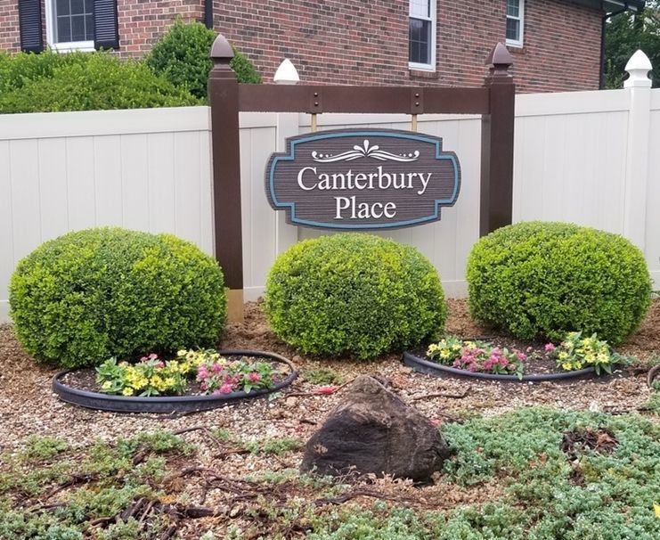 M4826 - Two  6 " x 6"  Wood Side Posts with Finials and a Top Horizontal 4" x 6" Wood Beam Support  this Hanging HDU  Sign for Canterbury Place.