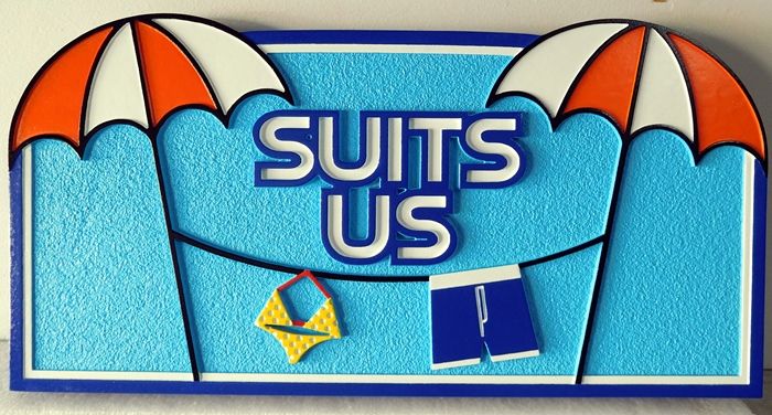 L21075 - Carved  Beach House Sign "Suits Us", with Swimming Suits Hanging in a Clothes line between Two Umbrellas