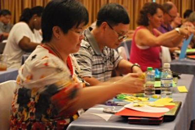 Missionaries express their emotions through art at the NCF Counseling and Member Care Seminar.