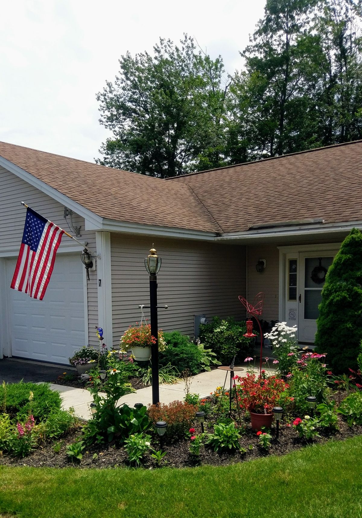 Photo of cottage with flowers