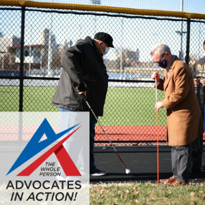 Photo of Darrin Sherman and 1 other man installing tactile marker on walking track.  Advocates in Action logo