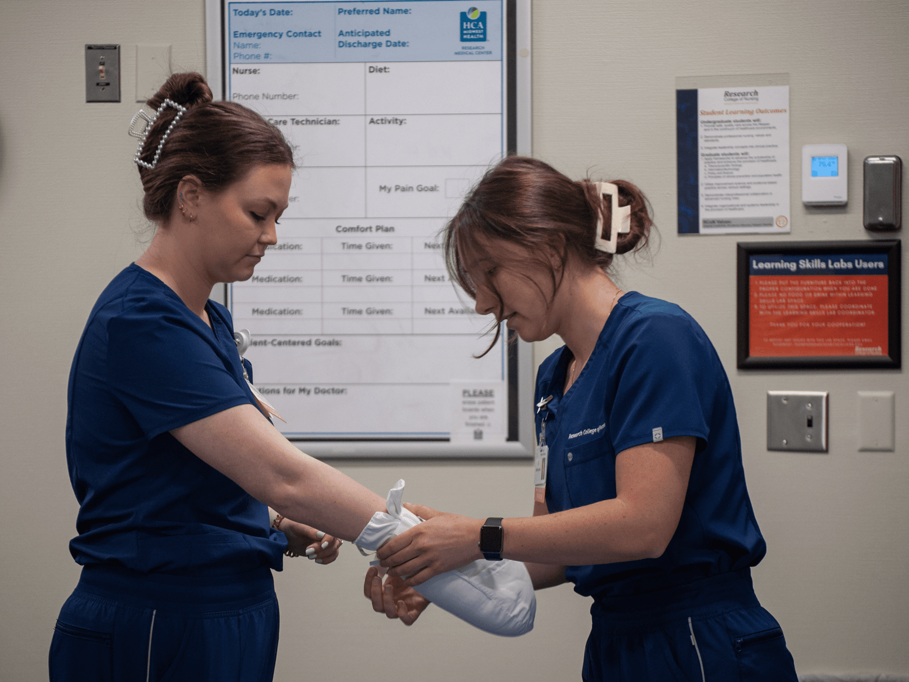 nursing students practicing dressing