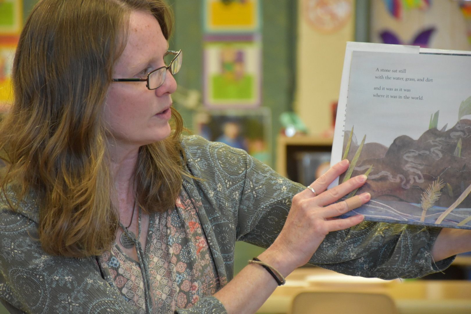 Ms. Maureen reads a story to preschoolers at Octorara YMCA program center. 