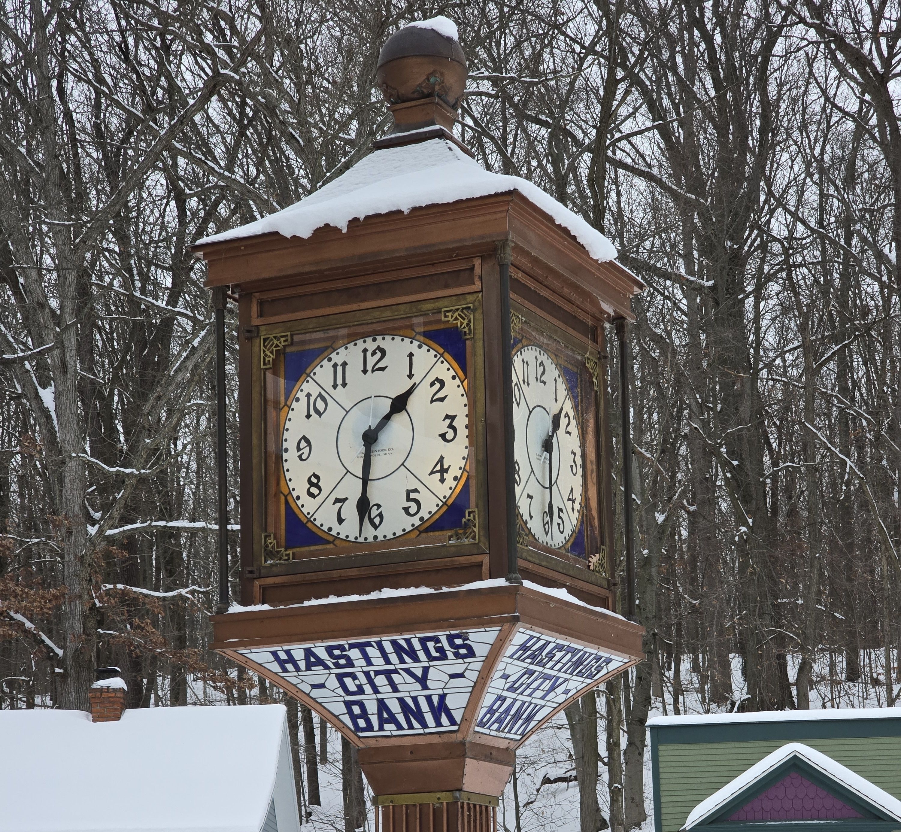 Trailhead with map and trail extending into distance. 