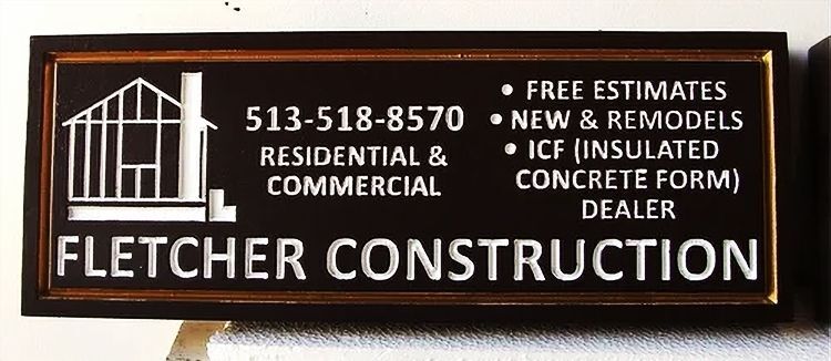SC38144  - Engraved HDU Sign for "Fletcher Construction Company"  with Logo of Building Under Construction